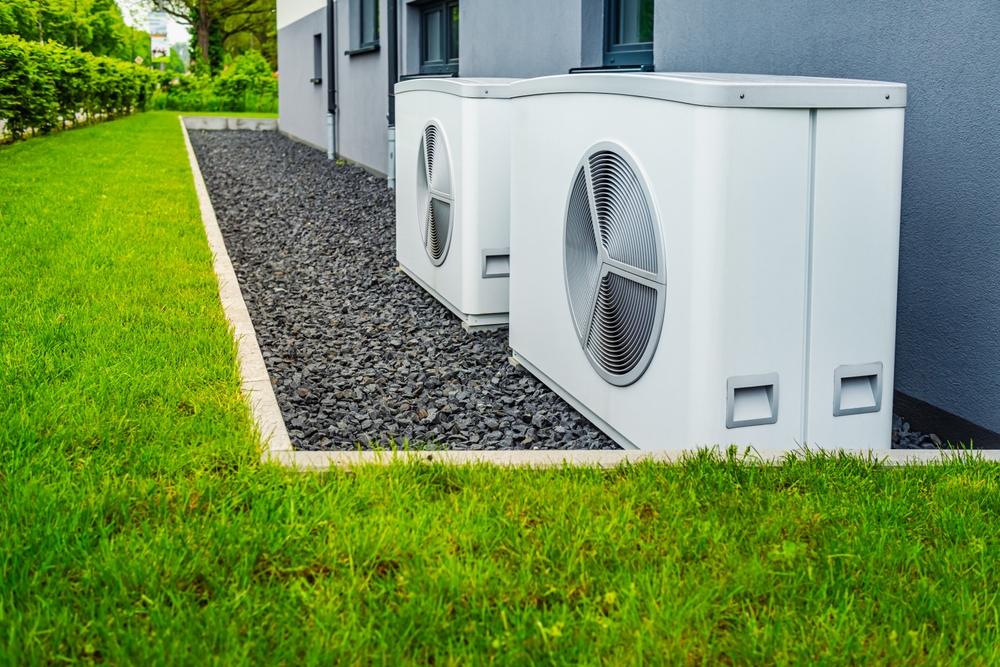 Two,Air,Source,Heat,Pumps,Installed,Outside,Of,New,And